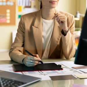 front-view-woman-working-desk.jpg