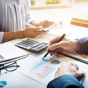 business-man-financial-inspector-secretary-making-report-calculating-checking-balance-internal-revenue-service-inspector-checking-document-audit-concept.jpg